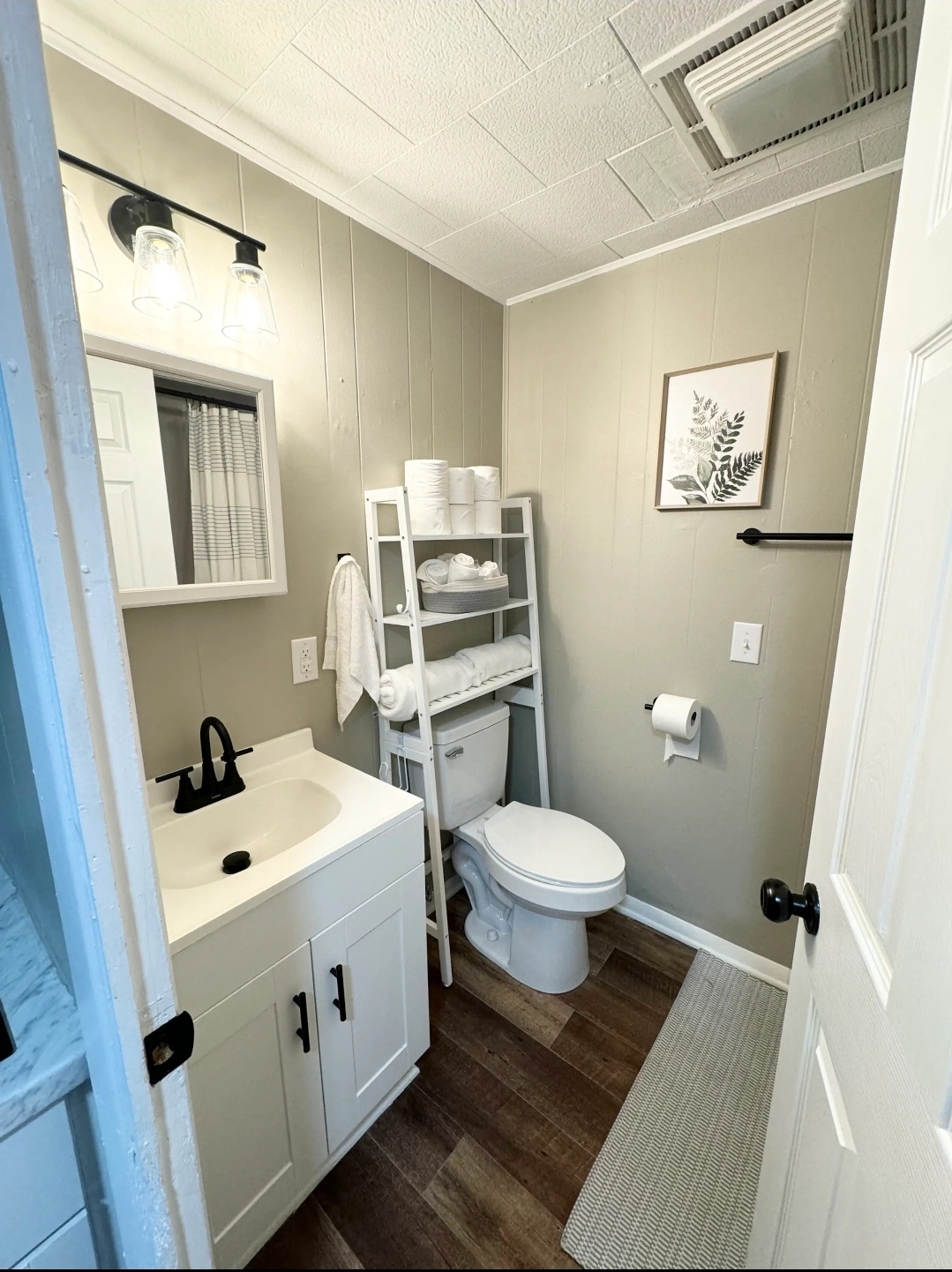 Unit 3 - Modern bathroom with vanity and towel storage