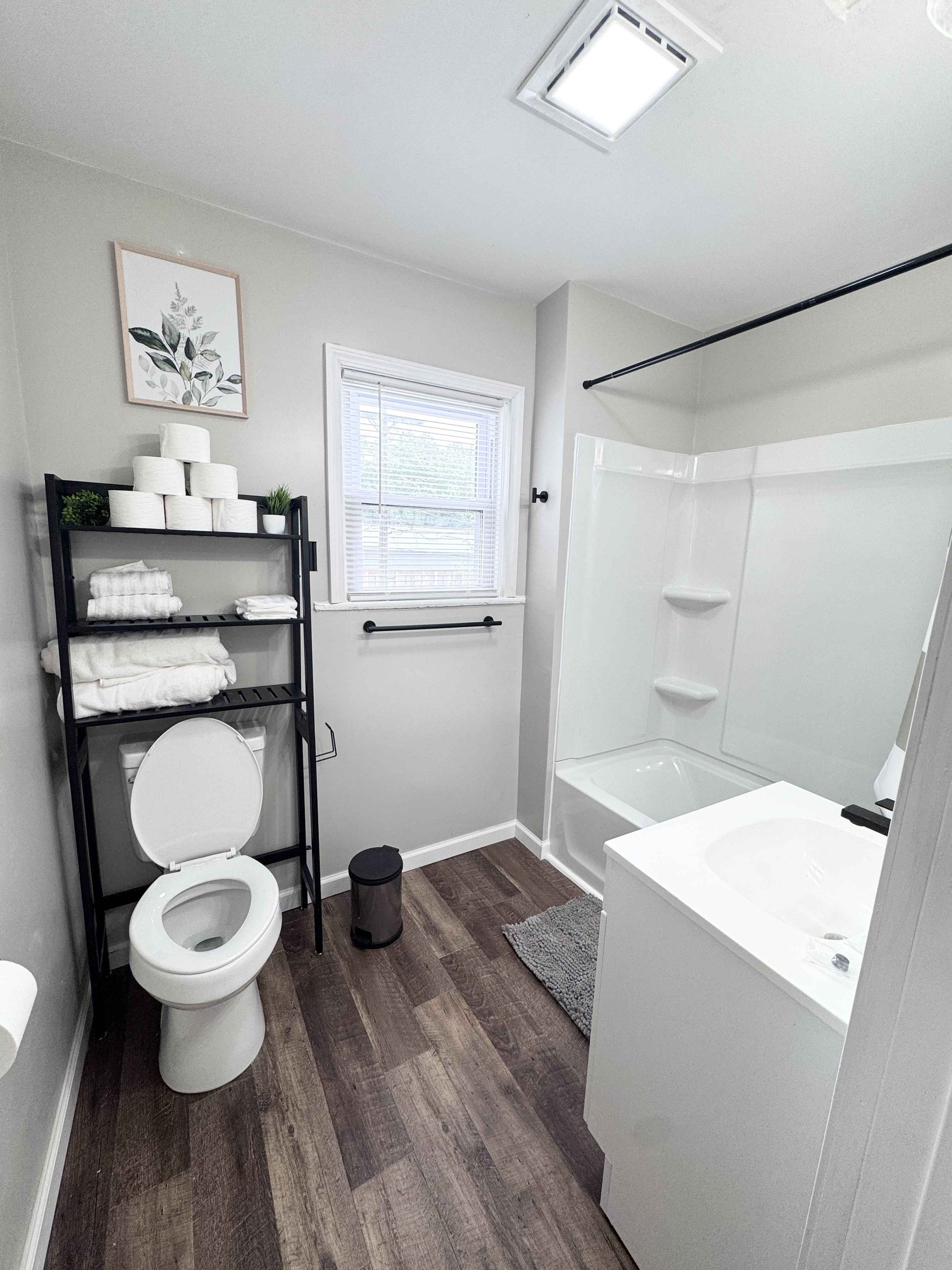 Unit 14 - Bathroom shower and towel storage