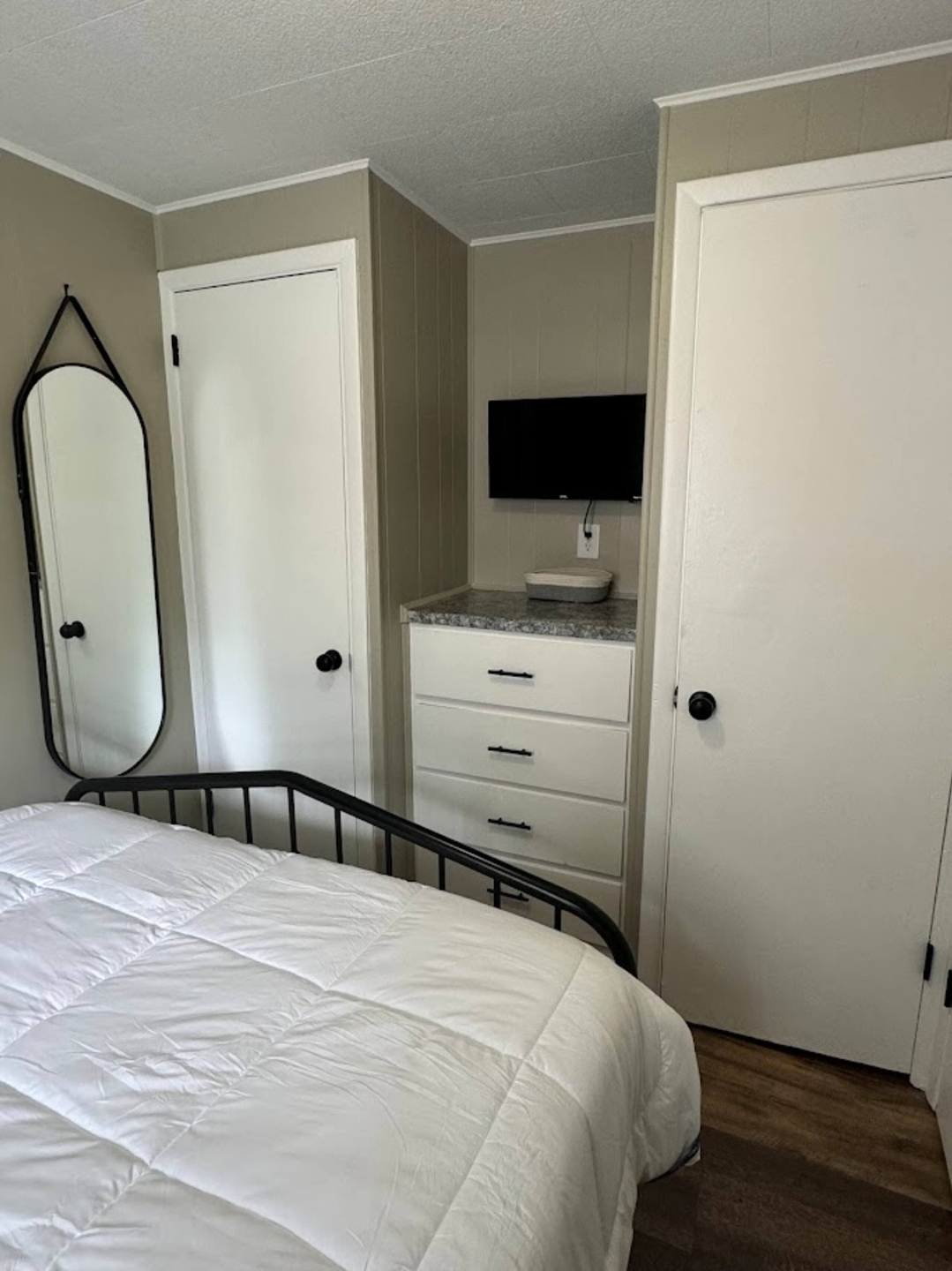 Unit 2 - Bedroom with queen bed and storage