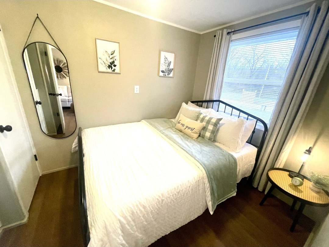 Unit 1 - Queen bedroom with natural light