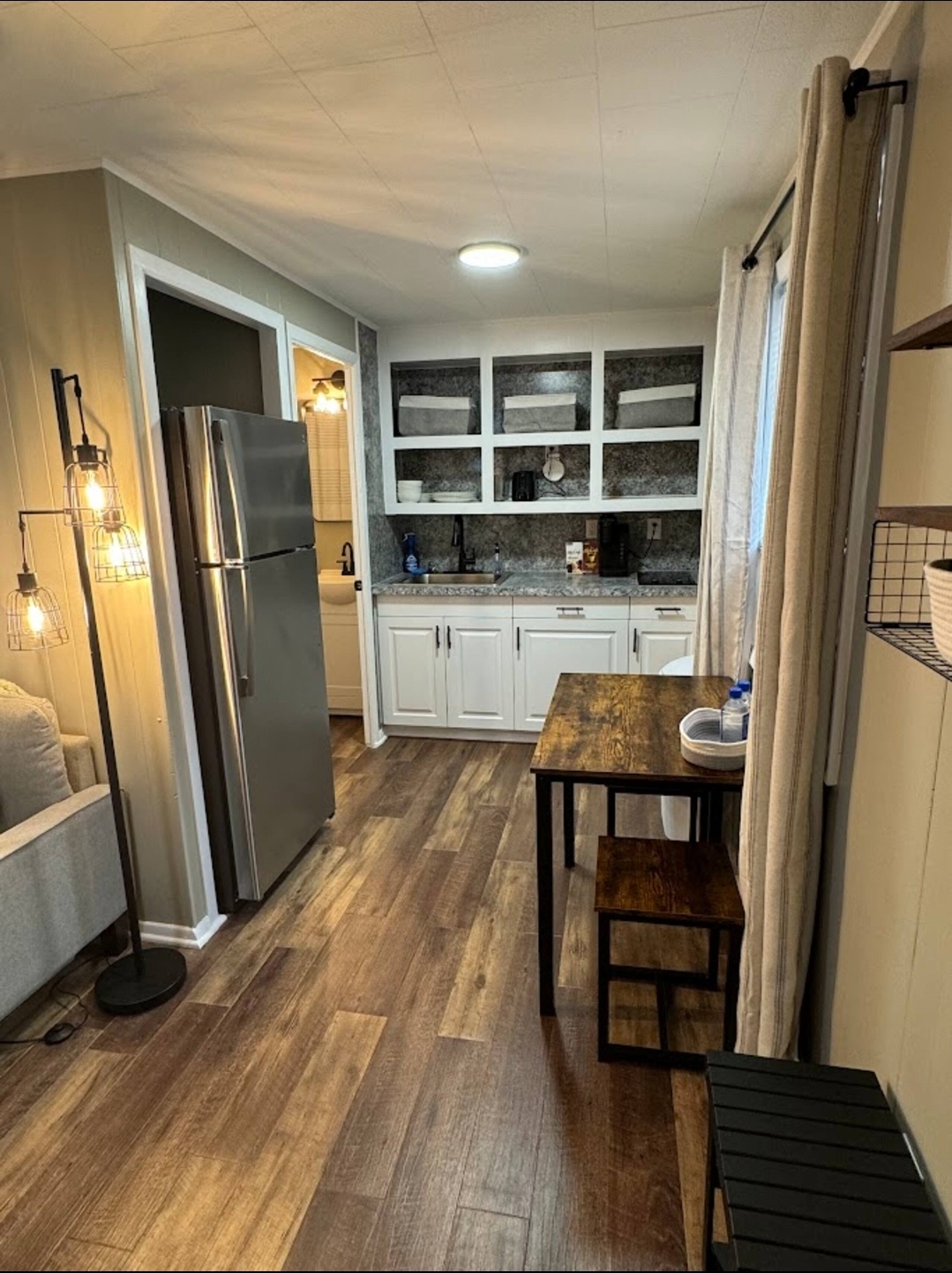 Unit 2 - Kitchen and dining area with rustic table