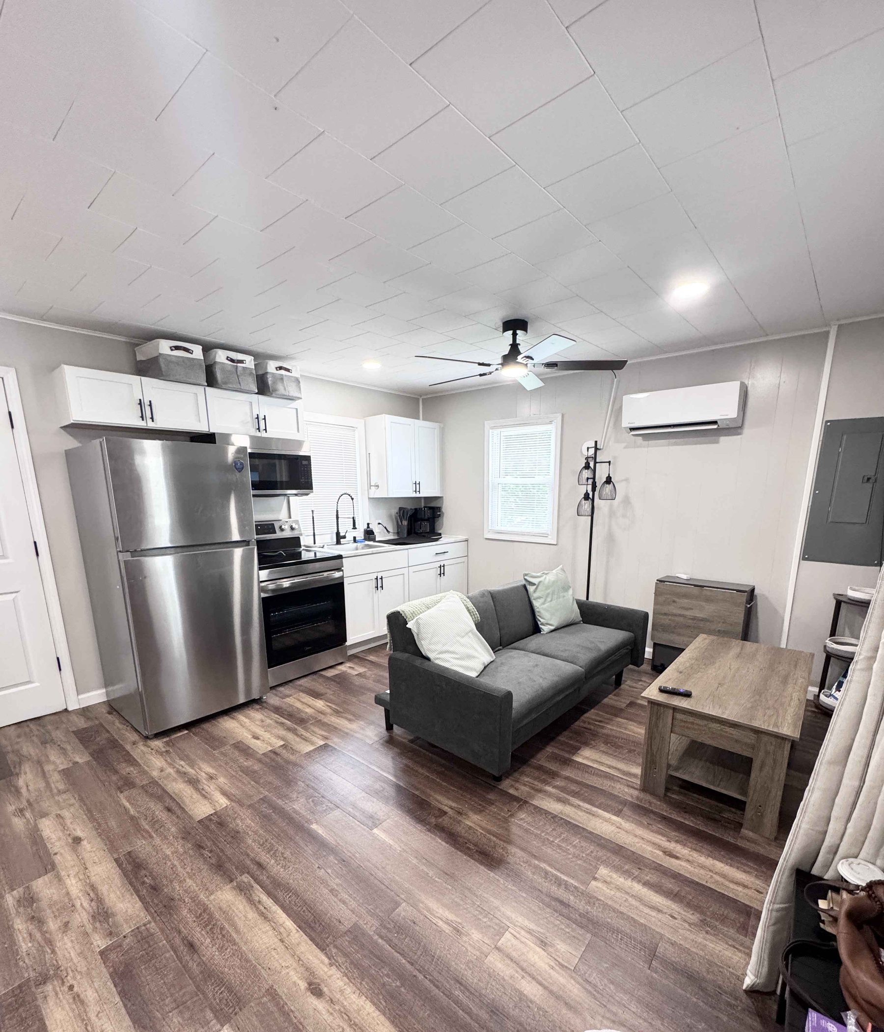 Unit 14 - Open kitchen and living area with stainless appliances