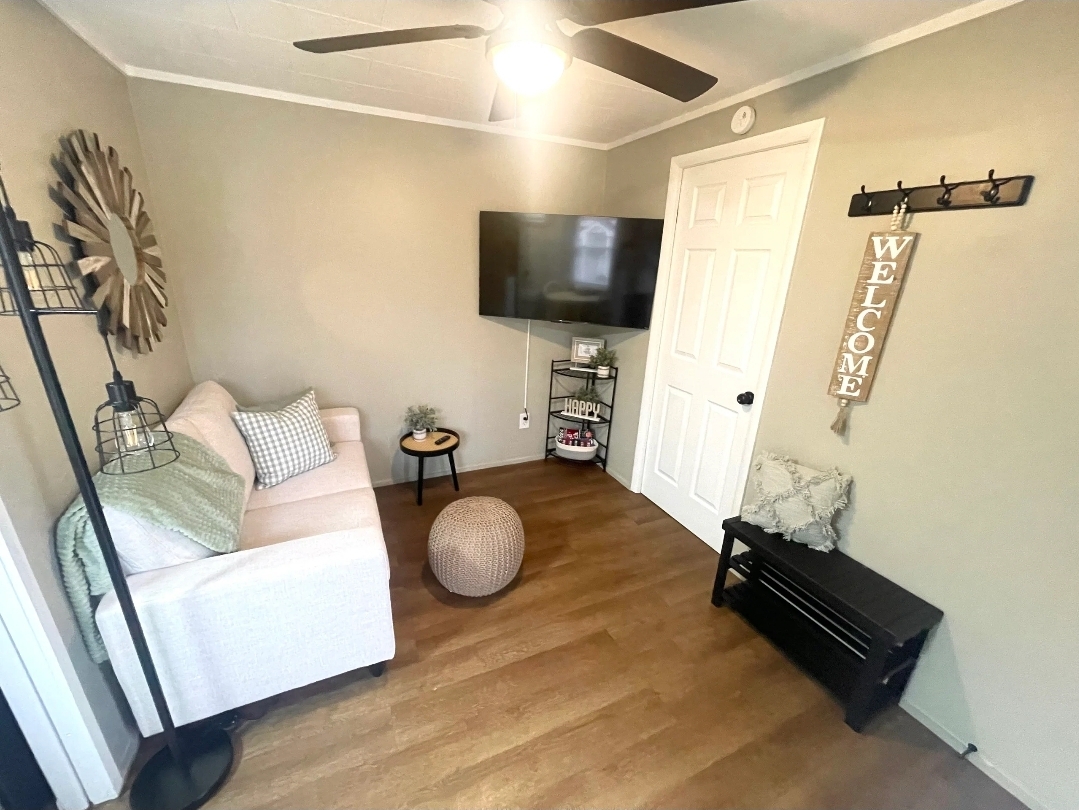 Unit 1 - Cozy living room with TV and comfortable seating