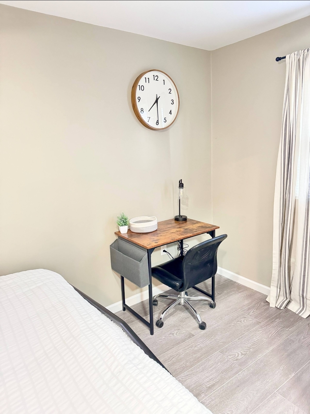 Cottage 13 - Workspace with desk and wall clock