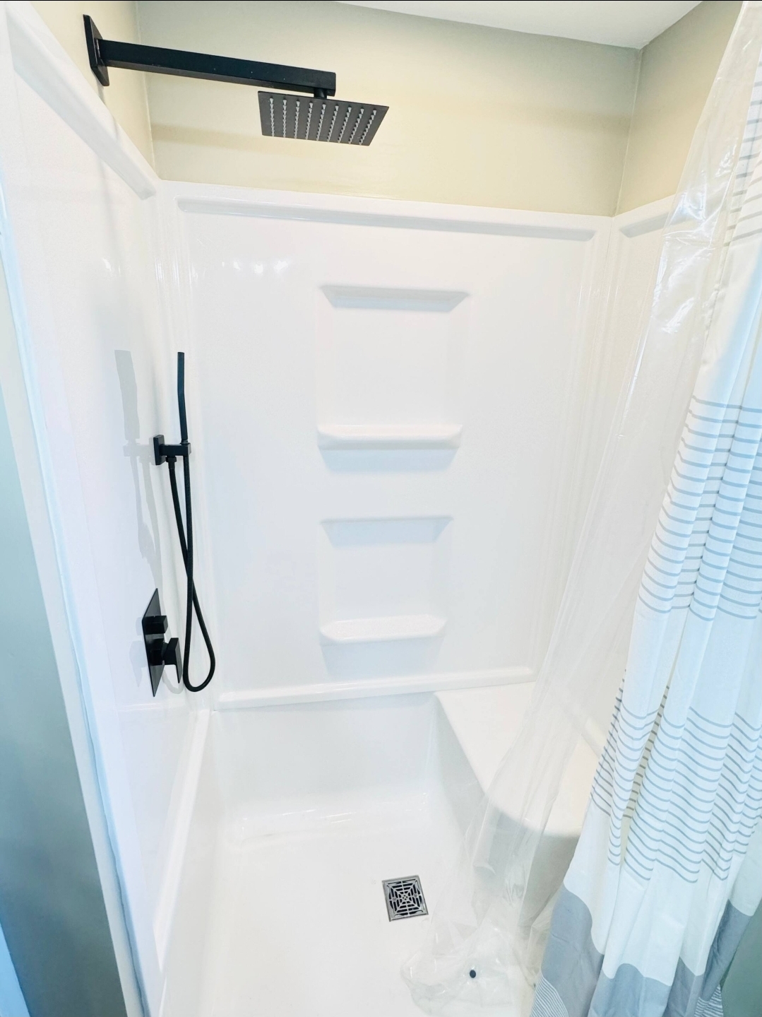 Cottage 13 - Rainfall shower with modern black fixtures